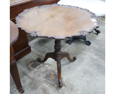 A George III style circular mahogany tilt top tripod tea table, diameter 81cm, height 74cm