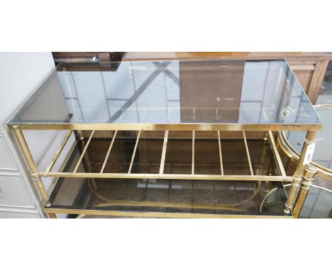 A brass and smoked glass two tier rectangular coffee table, width 99cm, depth 51cm, height 41cm