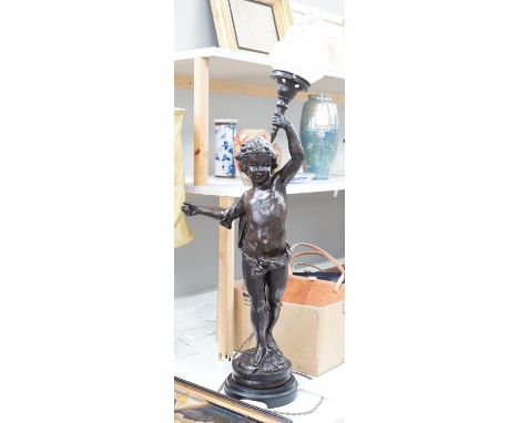 A bronzed composition cherub table lamp with frosted glass shade  Height 88 cm.