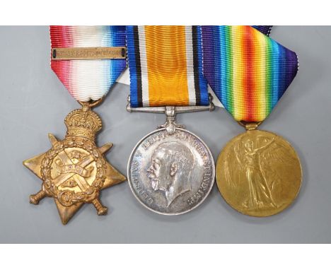 A WWI Mons star trio to 6958 PTE. W. H. EVANS WILTS R.