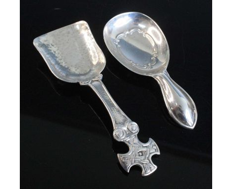 An Edwardian silver caddy spoon, having a lute shaped bowl with C-scroll decoration, maker James Deakin &amp; Sons (John &amp