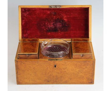 An early Victorian burr walnut and rosewood crossbanded tea caddy, the hinged cover opening to reveal a fitted interior of tw