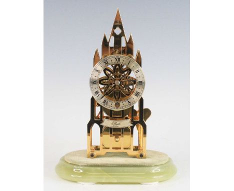 Elliott of London - a brass skeleton clock, of architectural Gothic outline, circa 1975, having silvered Roman chapter ring, 