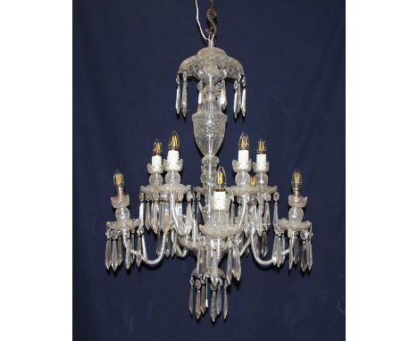 A mid-20th century Waterford cut crystal ten-light electrolier, arranged as two rows of five candle-arms, each supporting fac