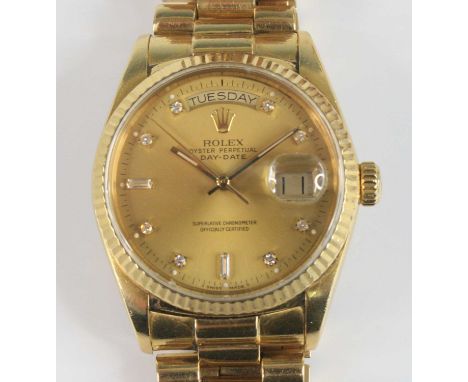A gent's 18ct gold Rolex Oyster Perpetual Daydate wristwatch, superlative chronometer officially certified, model No.18038, c