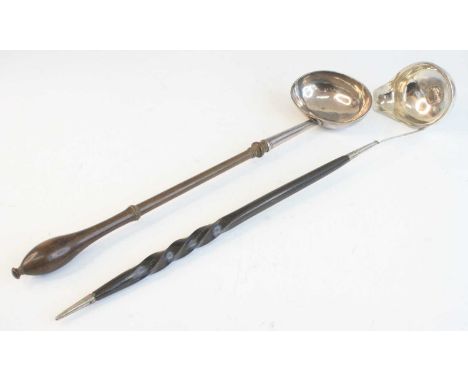 A George II silver toddy ladle, the bowl of plain oval form, on a ring-turned fruitwood handle with bulging terminal, maker J