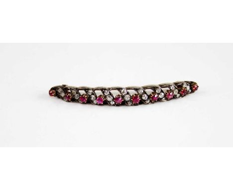 A yellow and white metal, ruby and diamond curved bar brooch, comprising ten graduated round rubies alternating with nine cur
