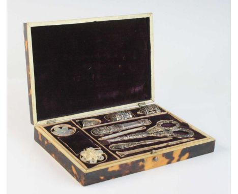 A 19th century tortoiseshell cased sewing box, the four-quarter veneered cover having monogrammed white metal plaque to centr