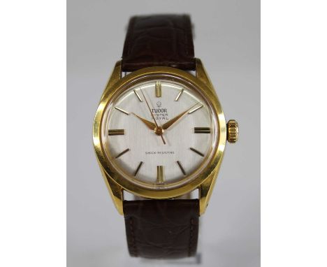 A gent's Tudor Oyster Royal gold plated manual wind wristwatch, having a signed silvered dial with baton markers, the steel b