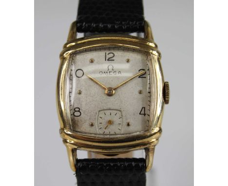 A gold plated Omega manual wind wristwatch, with cushion shaped cream Arabic dial and sub-dial at six. Fitted to a late leath