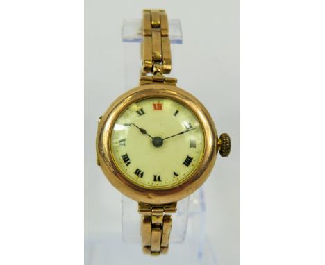 Vintage 9ct Yellow Gold mens watch with enamel face and expanding  Yellow gold strap .  Watch in running order.  Total weight