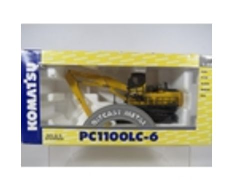 Joal Die Cast Metal 1:50 Scale Die Cast model of a Komatsu handler with Magnet attachment.. Boxed , Ex Display condition. See