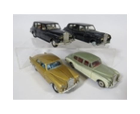 Four Vintage Dinky Rolls-Royces. Three Phantom V's, Silver Cloud. Three models in light playworn condition , one missing tyre