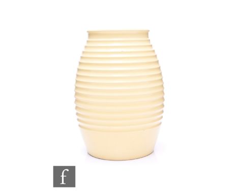 Keith Murray - Wedgwood - An Art Deco 'grenade' vase, circa 1930, of finely ribbed ovoid form with straw glaze, printed marks