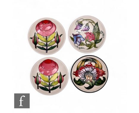 Emma Bossons - Moorcroft Pottery - A pair of RHS 'The Sphere' pin dishes, circa 2016, of circular form, tube line decorated w