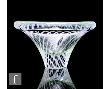 Vicke Lindstrand - Kosta -&nbsp;A glass dish&nbsp;of flared form, internally decorated with arcaded opaque trails, clear case