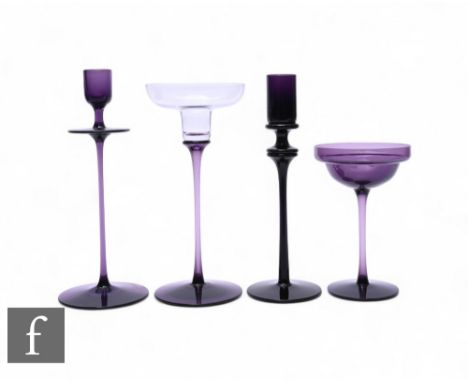 Ronald Stennett Wilson - Wedgwood - A RSW16/2 amethyst glass 'Cromer' candlesticks, coupe form on slender stem and circular f