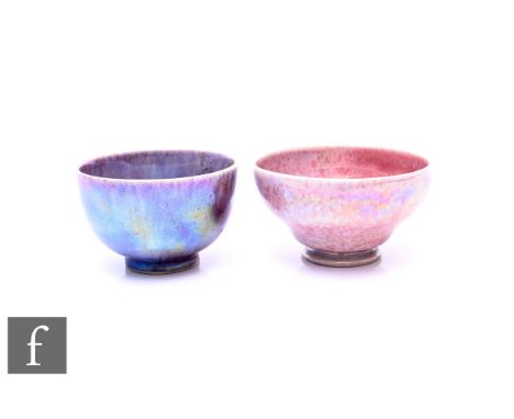 Ruskin Pottery - A pink souffle lustre bowl, of circular footed form with powder pink over grey glaze, printed black marks, d