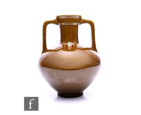 Burmantofts - An early 20th Century twin handled vase, with high drawn neck and twin angular handles, olive green glaze, impr