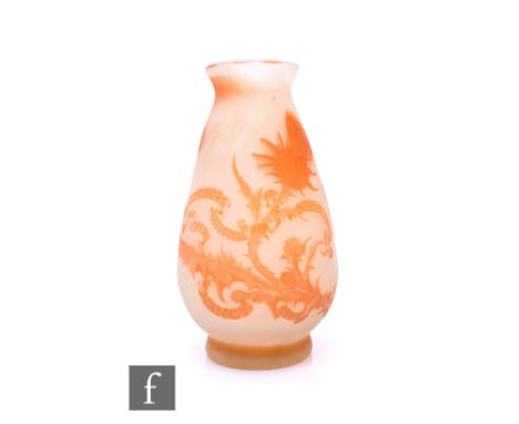 Galle - An early 20th Century Cameo glass vase circa 1906, the footed ovoid form with an everted rim, cased in a burnt orange