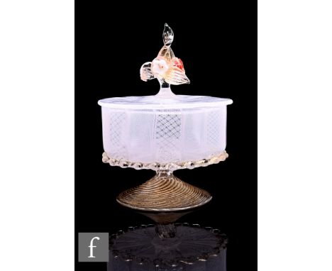 Murano Glass - An early 20th Century Italian latticino glass bowl and cover, of circular form, the cover with flower and leaf