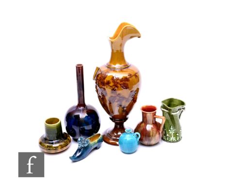 Burmantofts - A collection of art pottery, including a lobe and shaft vase, in graded brown to blue, impressed marks to base,