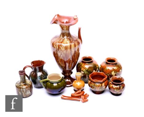 Linthorpe Pottery - A collection of art pottery, including floral decorated globe vase, height 8.5cm, trickle glazed ewer in 