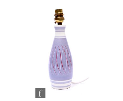 Alfred Rhead - Poole Pottery - A Freeform PRP lamp base, circa 1950, of slender inverted baluster form, decorated with red an