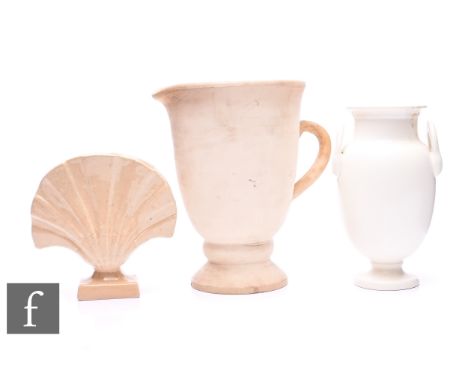 Constance Spry (British, 1886-1960) - Fulham Pottery - A footed jug, circa 1935, of bell form with loop handle on cushioned k