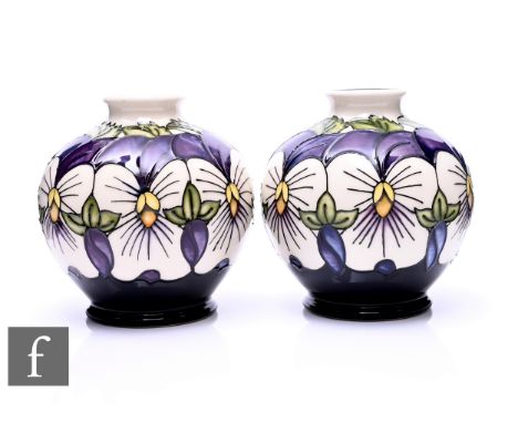 Rachel Bishop - Moorcroft Pottery - A pair of 'Viola Wing' Moorcroft Collectors Club vases, circa 2018, of ovoid form, tube l