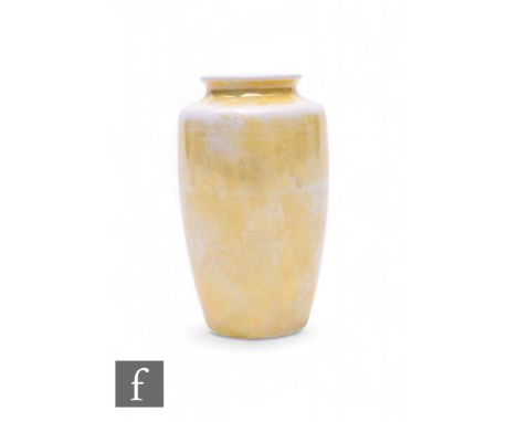 Ruskin Pottery - A yellow lustre vase, circa 1918, of shouldered form, impressed marks and date to base, height 10.5cm.