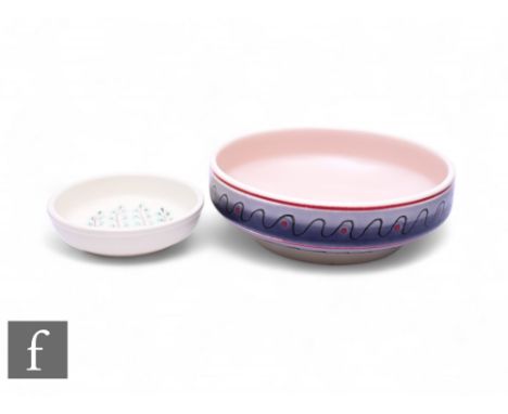 John Adams - Poole Pottery - A TNC shallow bowl, circa 1930, of circular footed form, painted with black wavy lines and red d