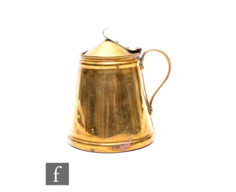 W.A.S Benson - A small early 20th Century Arts &amp; Crafts brass lidded pitcher with hand wrought thumb lift to the lip and 