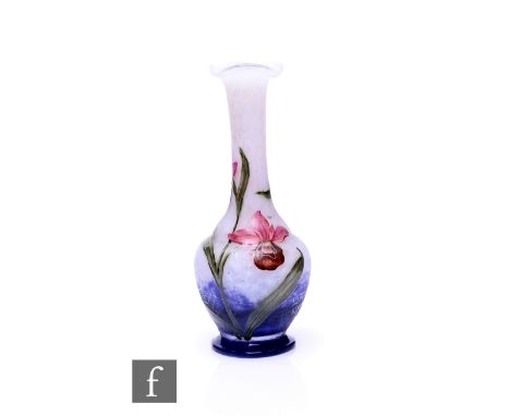 Daum - A miniature cameo glass vase of footed globe and shaft form with tall slender neck and wave rim, cased over a mottled 