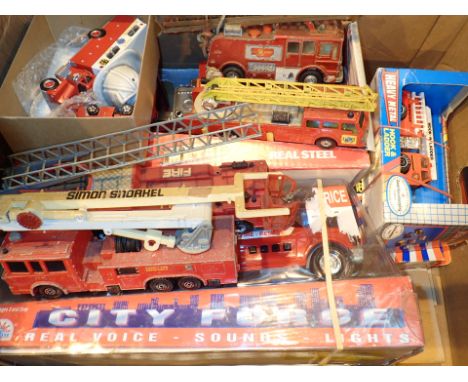 Box of diecast fire engines including Dinky and Corgi 