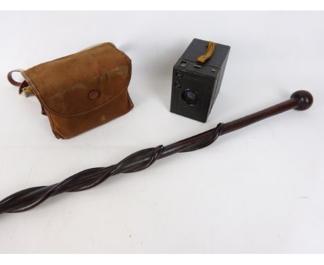 Eastern Hardwood walking stick carved with two snakes, L95cm & a Zeiss Ikon Tengol box camera with Goerz Frontar lens, in cas