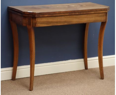 Early 19th century mahogany fold over card table, top with canted corners, baize lined interior, on sabre leg supports, W92cm