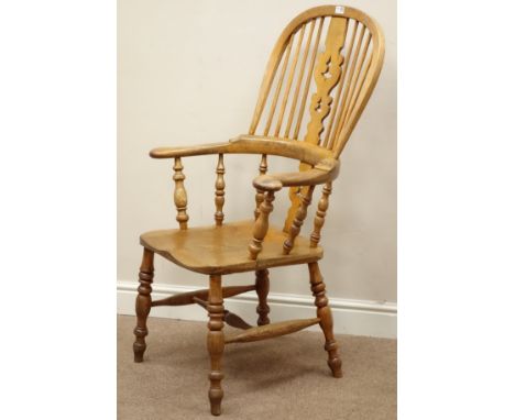 19th century elm high back Windsor armchair, pierced splat and stick back, on turned supports   Condition Report   Click here