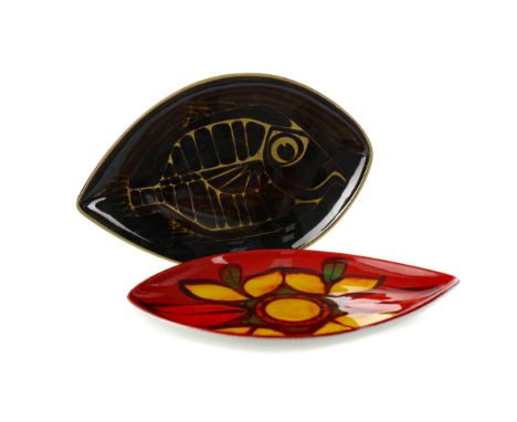 POOLE POTTERY DELPHIS DISH, of oval form, decorated in yellows greens and oranges with abstract fruits on a red ground, print
