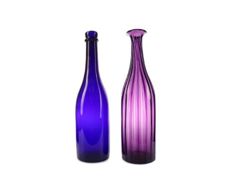 WILLIAM IV AMETHYST GLASS DECANTER, of wrythen mallet form, polished pontil, along with an early 19th century Bristol blue ex