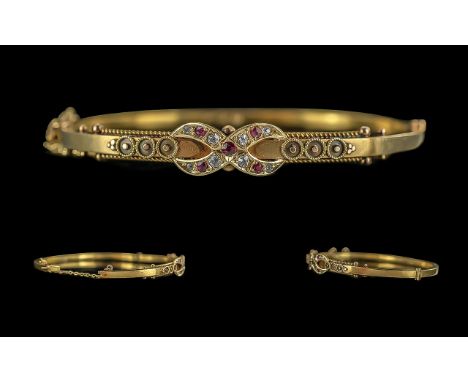 Victorian Period 1837 - 1901 Excellent 15ct Gold Exquisite Ruby and Diamond Set Hinged Bangle. Marked 15ct to Bangle. The Rub