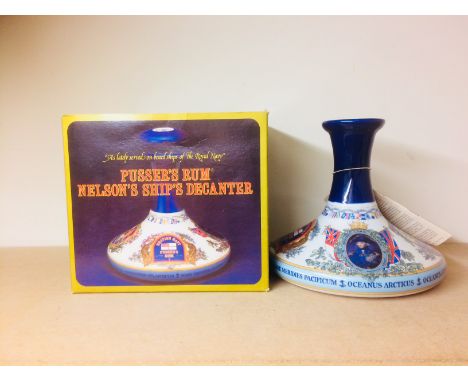 PUSSER'S RUM NELSON'S SHIP'S DECANTER Navy Rum. 
1L, 54.5% volume, in ceramic Wade decanter with stopper, in box.  CONDITION 