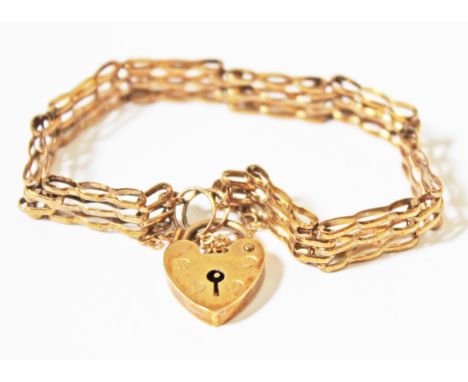 A hallmarked 9ct gold gate bracelet, wt. 7.7g.