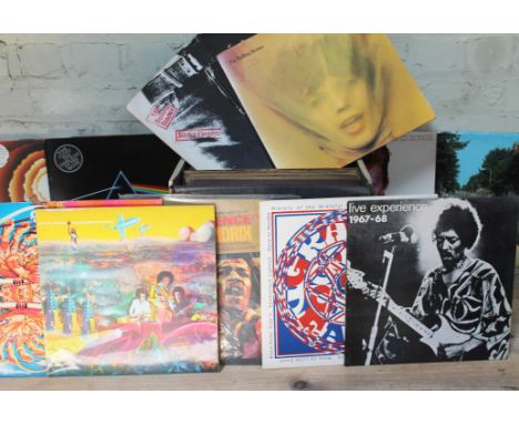 A box containing approx. 21 LPs including Jimi Hendrix, The Greatful Dead, The Beatles, Pink floyd, The Rolling Stones, Buddy