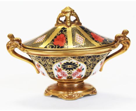 A Royal Crown Derby Old Imari 1128 sucrier and lid, length 18.5cm. Condition - marked as second otherwise very good, no damag