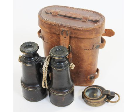 A pair of French field binoculars and a WWI compass.