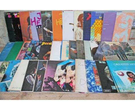 A box of approx. 37 LPs including Jimi Hendrix, Bob Dylan, Cat Stevens and the rolling Stones visual grading G