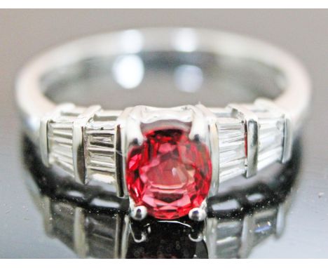 A hallmarked 18ct white gold diamond Tanzanian ruby ring, gross wt. 2.9g, size N, with copy of certificate.