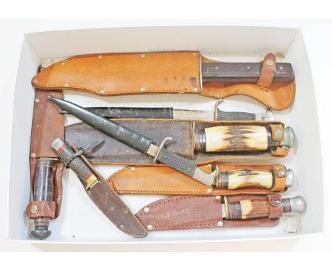 A box of various hunting type knives comprising three with antler handles, two German scout type knives, a bowie knife and tw