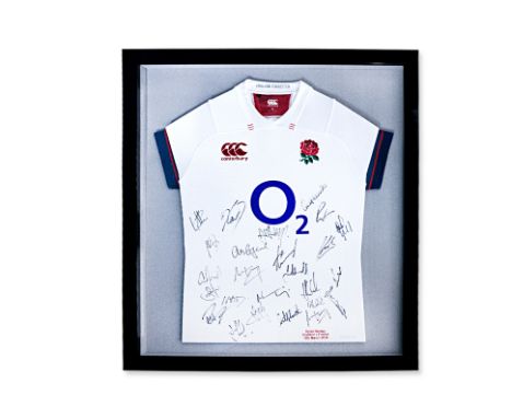 A FRAMED DYLAN HARTLEY JERSEY SIGNED BY ENGLISH SQUAD
Jersey from France v England 10 March 2018. 
Mounted in a black lacquer